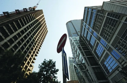 为解资金之渴 中国房地产公司将举债潮引向海外
