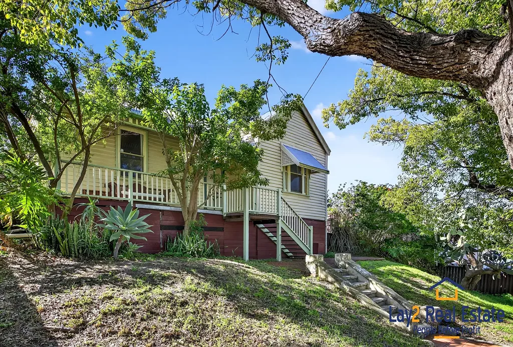 Bayswater 4 Bedroom Elevated Character Home with Verandah, Views, and Garden Sanctuary