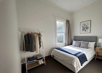 Sunny Renovated Home with no Lawns to Mow!