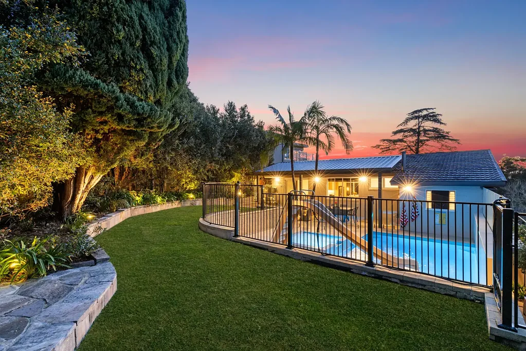 Renovated mid-century masterpiece with resort-style living and Oyster Bay views - with pool and garden maintenance included.
