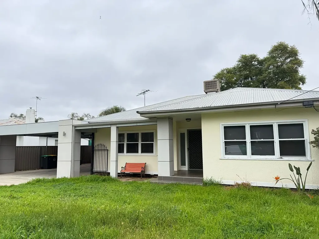 Four Bedrooms, Two Kitchens & Endless Possibilities!