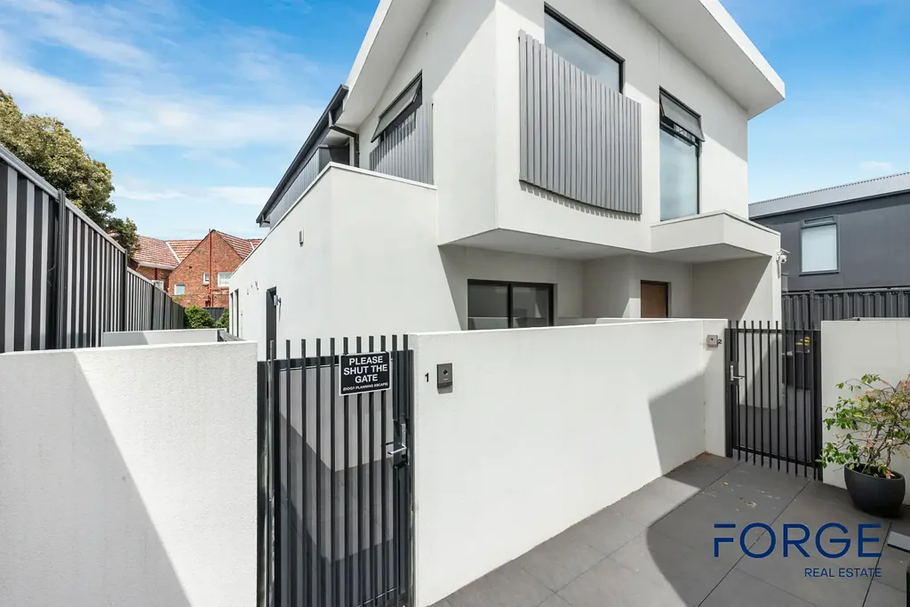 Architect-Designed Luxury Town Residence with Wine Cellar and Double Garage in Brighton East