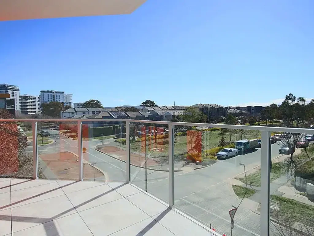 2 BEDROOM CORNER APARTMENT WITH SWEEPING VIEWS ACROSS HUGE BALCONY - IN SOUGHT AFTER METRO ONE BUILDING