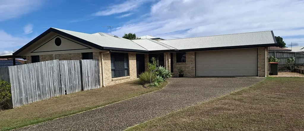 SPACIOUS 4 BEDROOM BRICK HOME.
