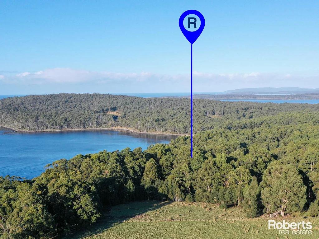 Southport Stunning Southport Acreage with Water Frontage