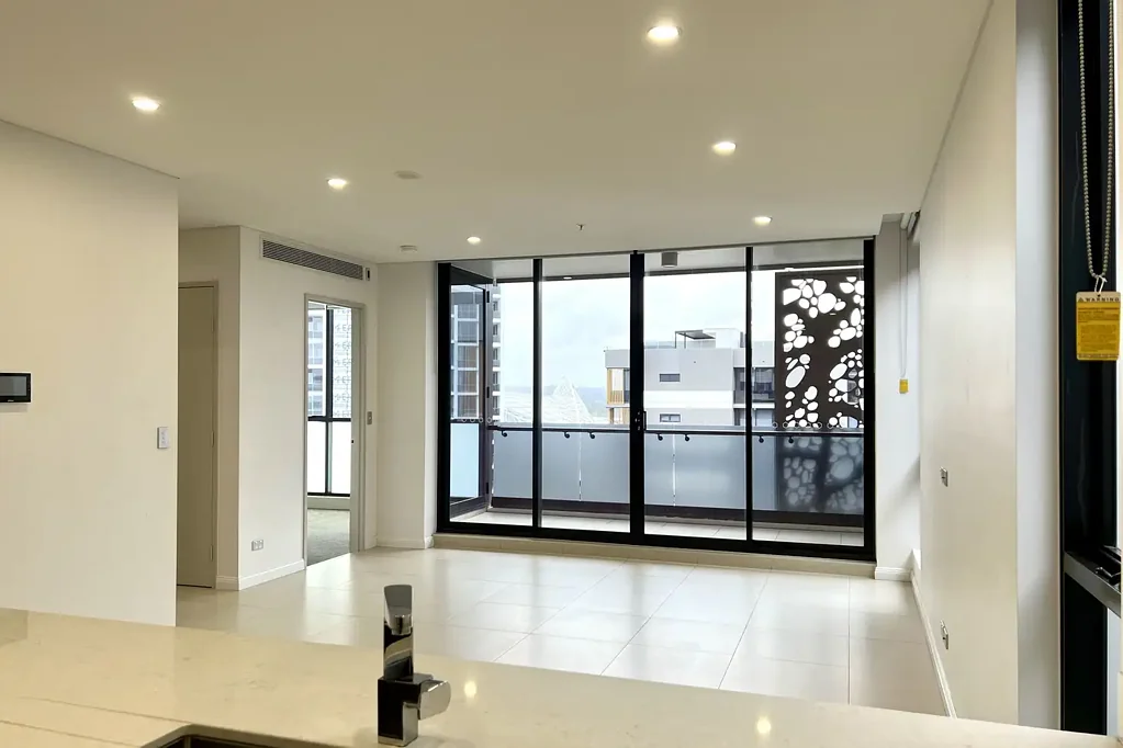 Kitchen Island & Bathtub & Meriton Complex & Downstairs Supermarket and Restaurant & Tiles in the Living Area