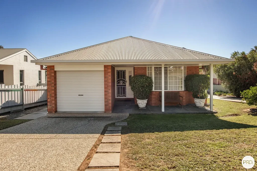 STYLISH TWO-BEDROOM TOWNHOUSE WITH POOL!