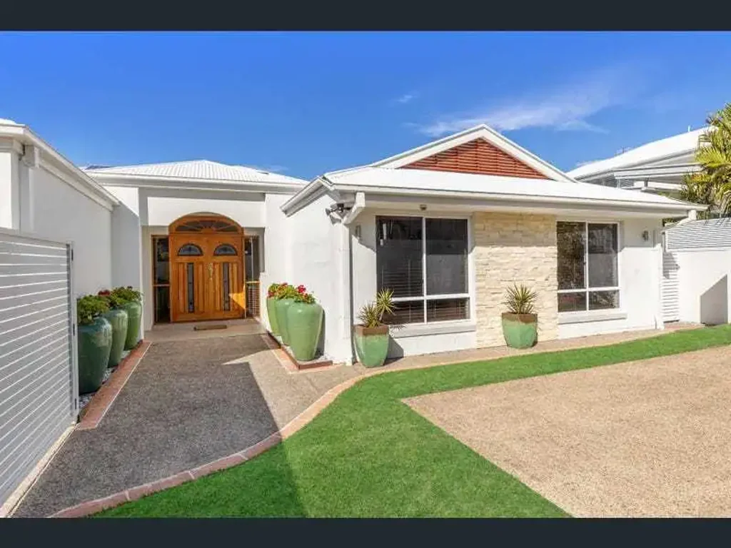 This beautifully presented four-bedroom home is situated in one of Noosaville's most sought-after streets.