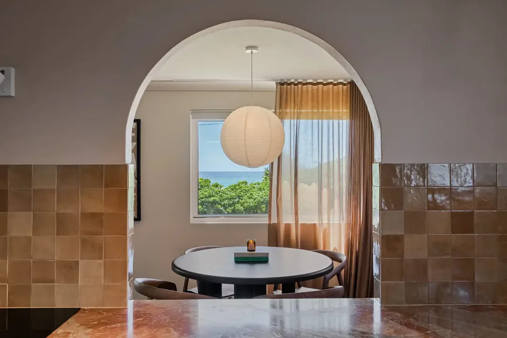 Coastal Elegance with Ocean Glimpses, Beautifully Renovated Beachside Unit