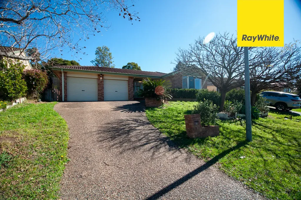 FRESHLY UPDATED FAMILY HOME WITH DRIVE-THROUGH DOUBLE GARAGE