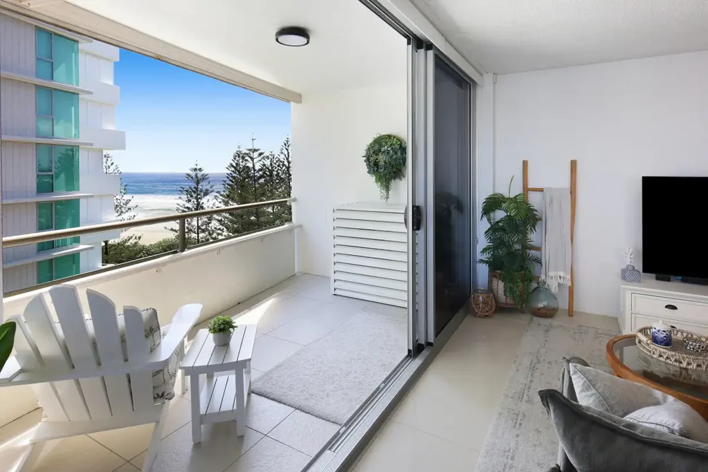 Top Floor Beachfront Living with Sweeping Ocean & Hinterland Views
