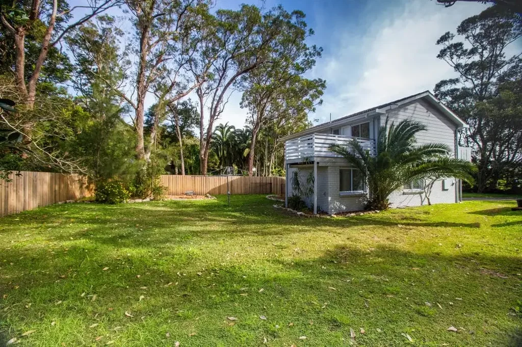 Family Home set on a flat fenced yard