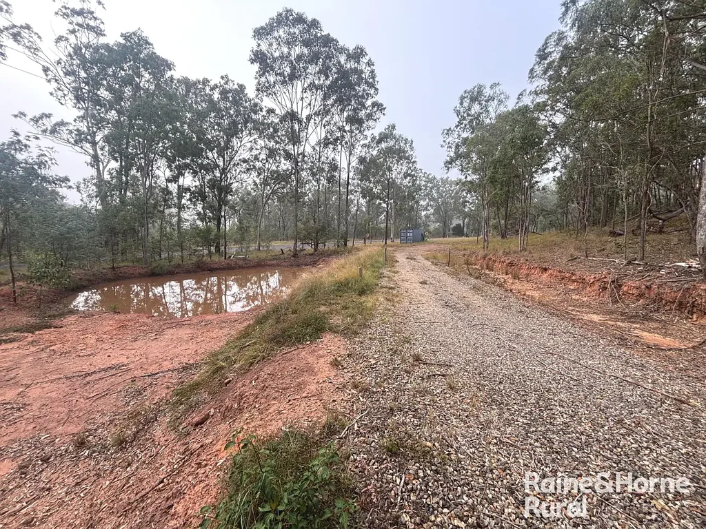 Wattle Camp 6acre广阔天地 预留建房地基 双雨水水箱 美式谷仓套件 微型住宅潜力 碎石车道通幽 Great starting point for your dream property.