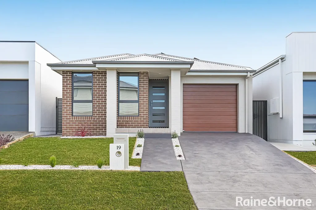 Brand New McDonald Jones Home With Solar Panels & EV Charger