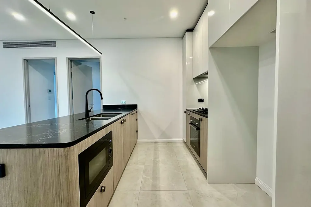 NEAR NEW WITH ON-SITE POOL, GYM & BBQ FACILITIES