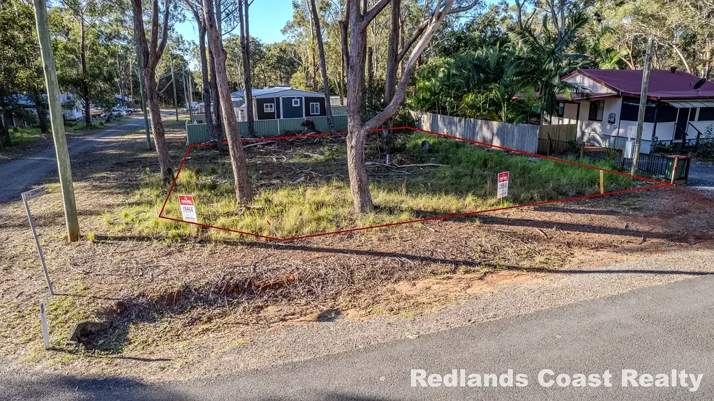 Russell Island Corner block with Installed Septic, Power, Water and Building Approval for 1 Bed Container Home and Double Garage