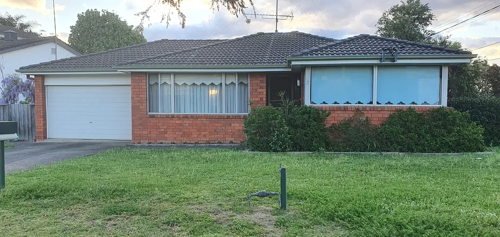 Family home with large Detached Garage & Extra Storage Room