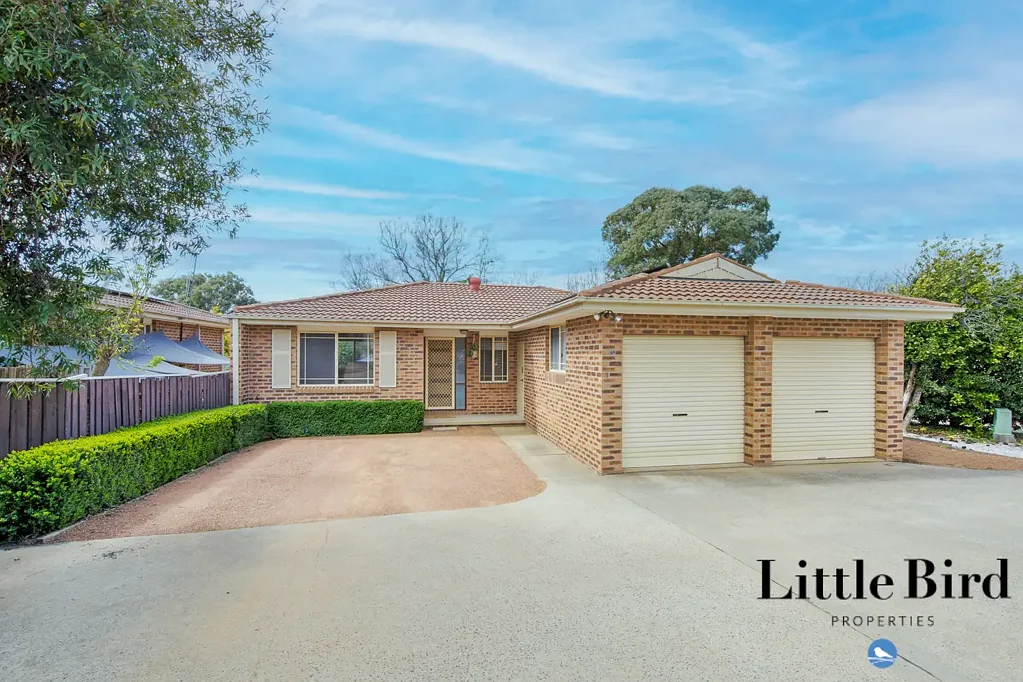 Spacious Three-Bedroom Townhouse with Private Yard