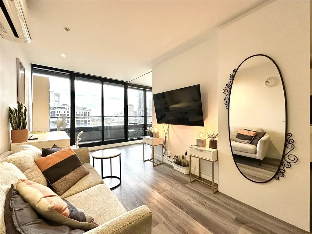 FURNISHED FLOORBOARD TWO BEDROOM APARTMENT LOCATED IN AURA APARTMENT - MELBOURNE CBD
