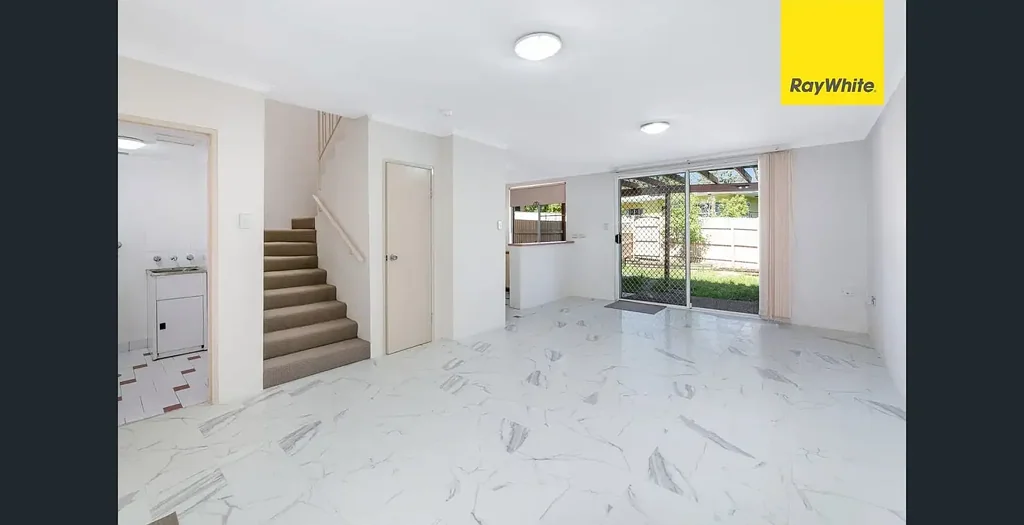 3 Bedroom Townhouse Quietly Nested in Back of the Complex!