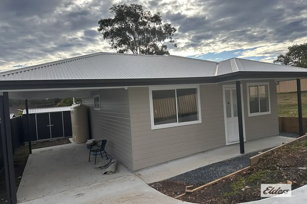 BRAND NEW PRIVATE GRANNY FLAT with yard maintenance and water included!