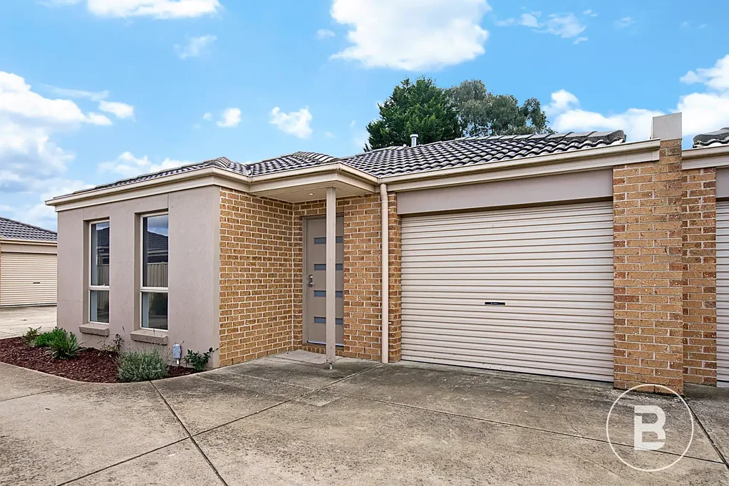 TWO BEDROOM WITH YARD IN NEAT COMPLEX