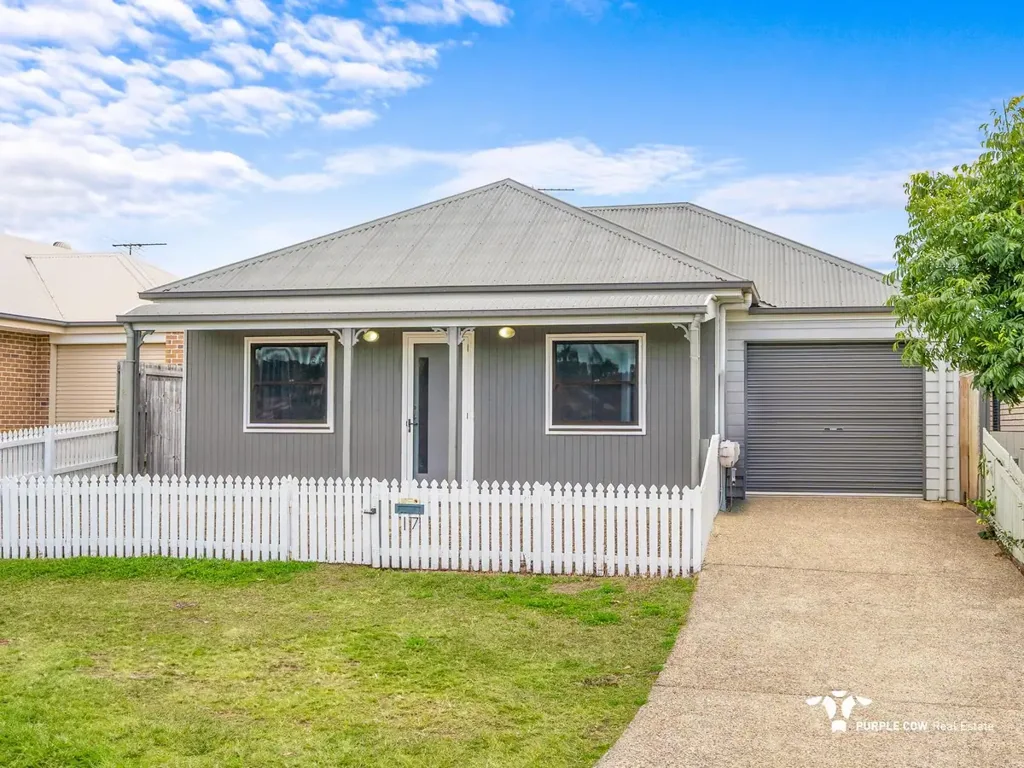 Charming Cottage with White Picket Fence.