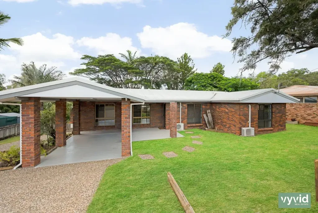Family home with multiple living areas and covered outdoor deck