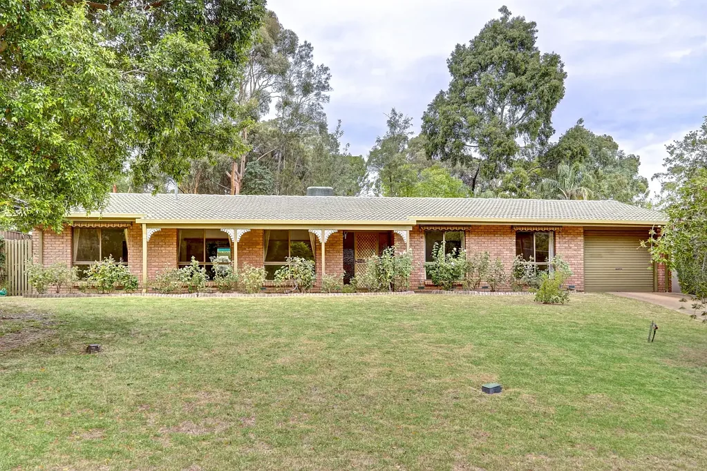 Neat Family Home With Large Backyard