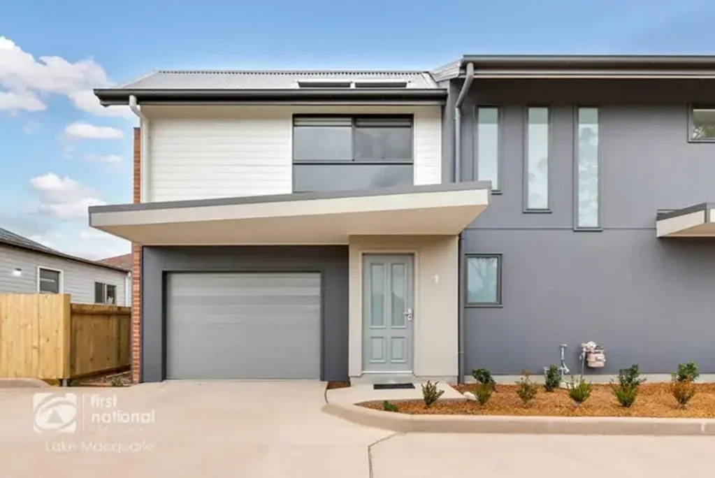 BEAUTIFULLY MAINTAINED TOWNHOUSE OFFERING COMFORT AND PEACE