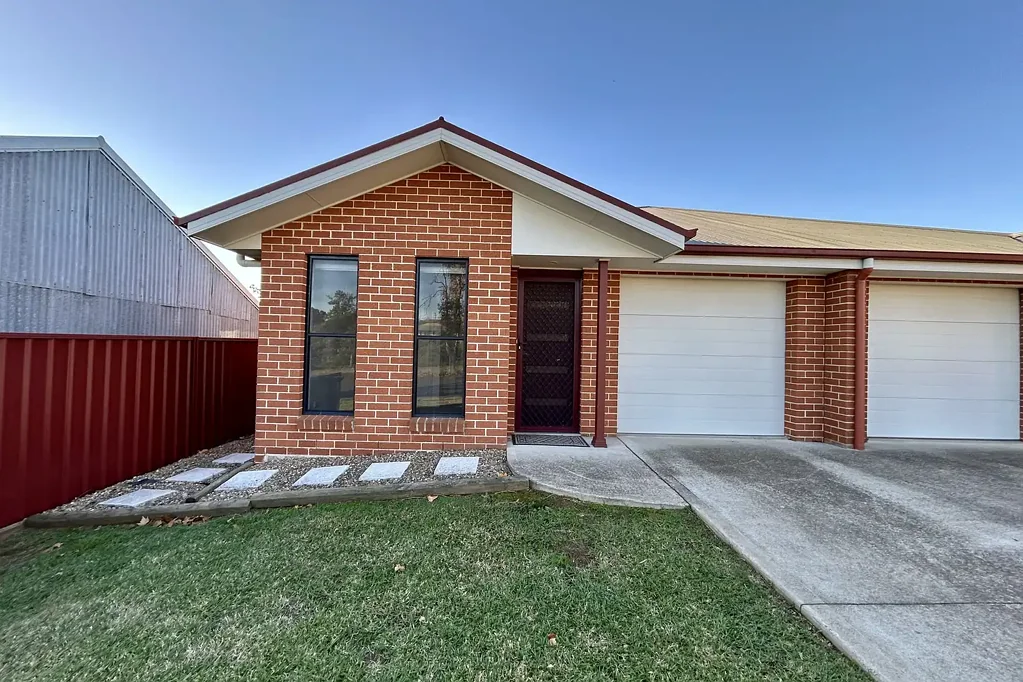 Modern Unit with Lawn Maintenance Included