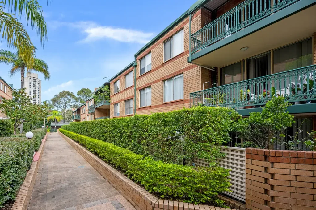 Expansive two bedroom apartment with two secure car spots & access to pool, spa & gym