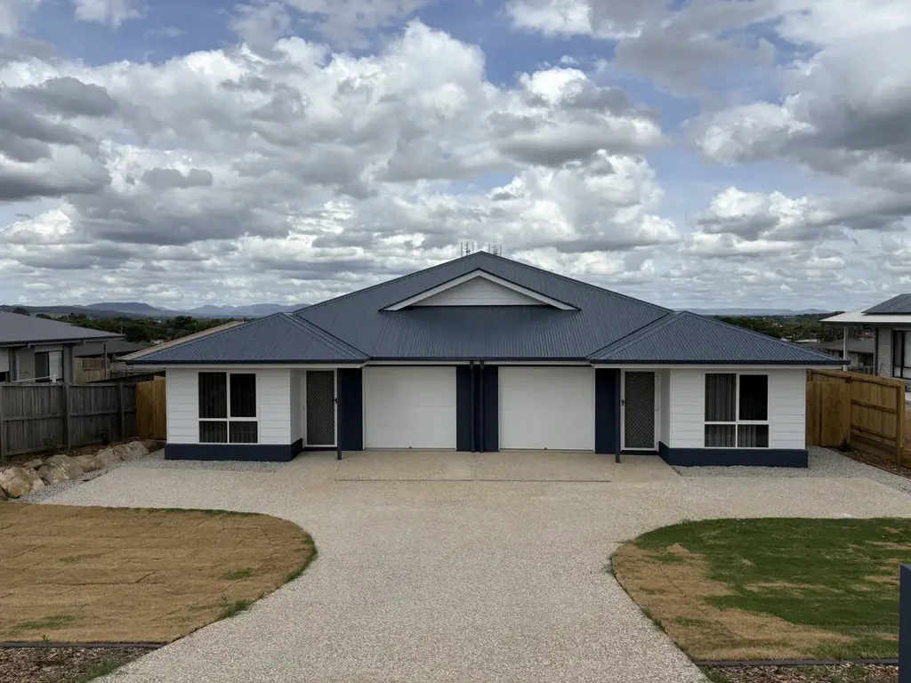 NEAR NEW - EASY TO MAINTAIN UNIT