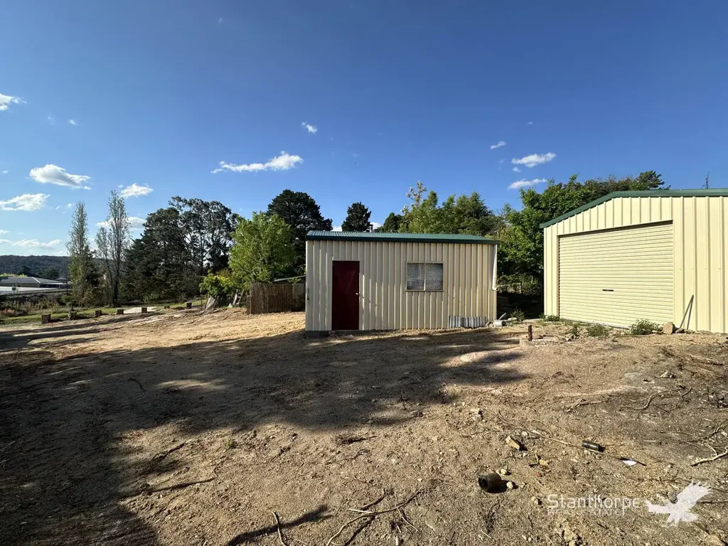 Stanthorpe STANTHORPE - 1,026M2 BUILDING BLOCK WITH SHEDS WALKING DISTANCE TO MAIN STREET