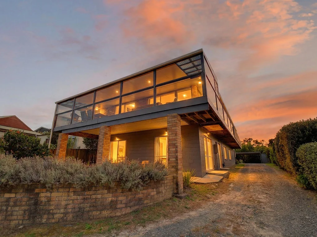 Russell 6 Slaapkamer Coastal Living with Dual-Level Flexibility