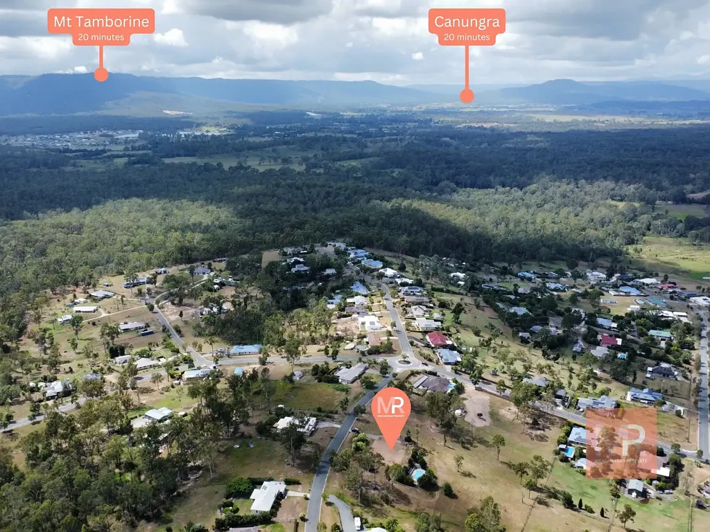 Mundoolun 2.5 Acres of land with pool & tanks.