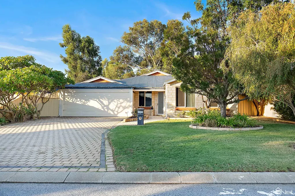 Seville Grove 4 Bedroom Family 4x2 set amongst LUSH GARDENS