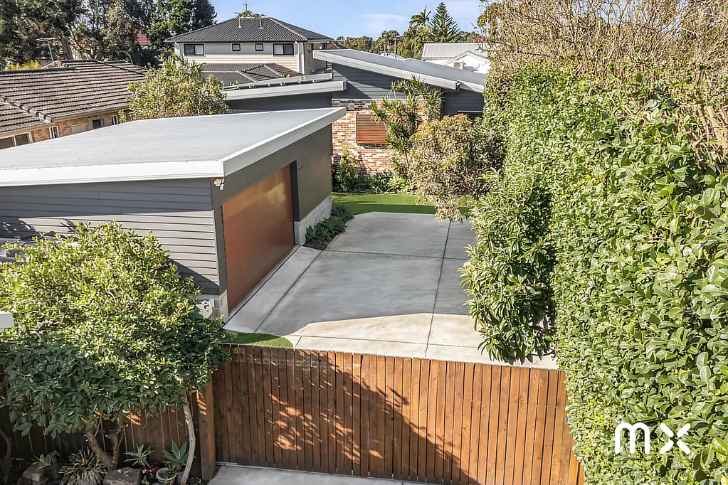 Corrimal 3房 建筑私享圣所 私密后置地块 开放式空间 现代燃气厨房 主卧带衣帽间 独立浴缸淋浴 硬木地板 全自动门禁 双车库带设施 额外休闲室 大型太阳能系统 低维护景观 Ikigai