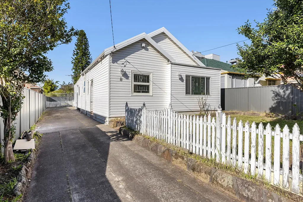 Four-Bedroom Cottage with a Large Level Backyard