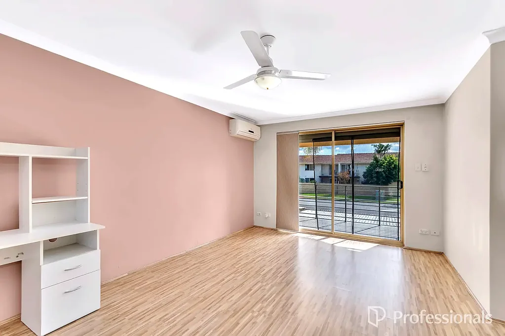 This 1st floor apartment has a front court yard and balcony!!