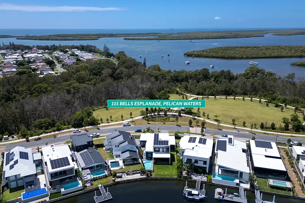 Pelican Waters 5 Bedroom Modern Waterfront Elegance With Expansive Garage The Comes With Additional Workshop Space