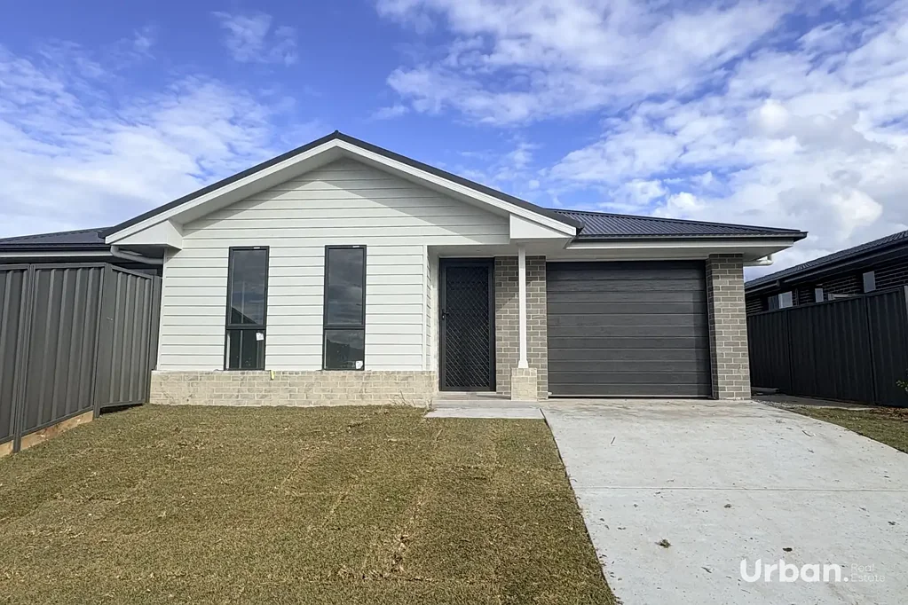 Three-bedroom Duplex in Lochinvar. 
Both Duplexes are available to rent.