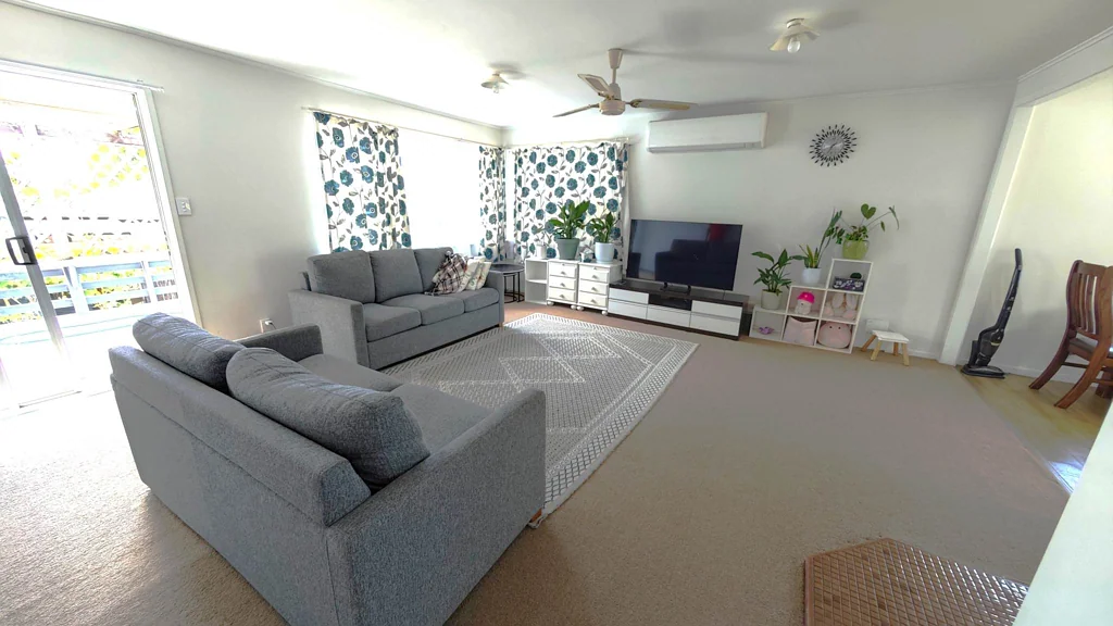 Sunny 3-Bedroom Home with Sunroom and Off-Stre...