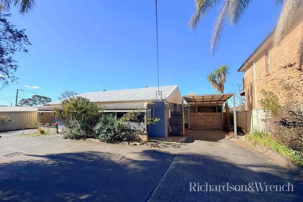 Spacious Family Home with Huge Garage, Studio & Multiple Car Spaces