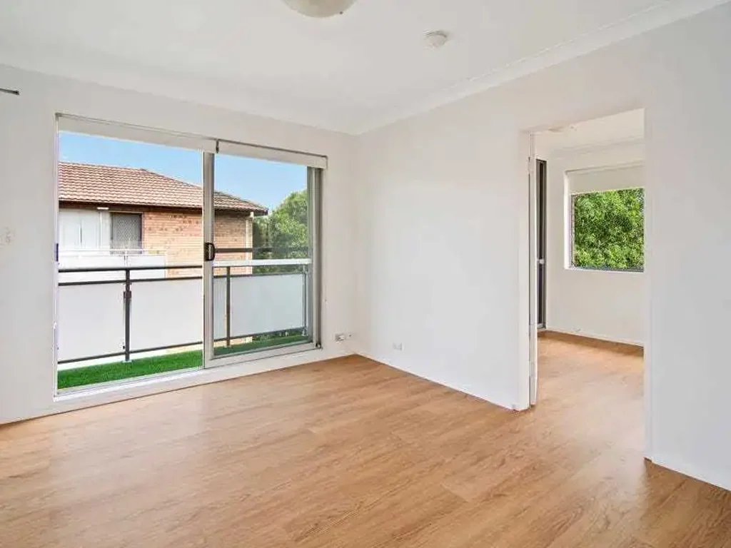 Bright Top Floor Apartment with Balcony and Parking