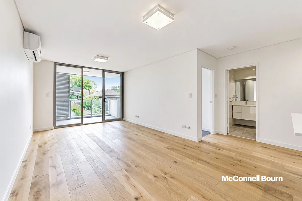Spacious & Sunlit Apartment with Timber Flooring
