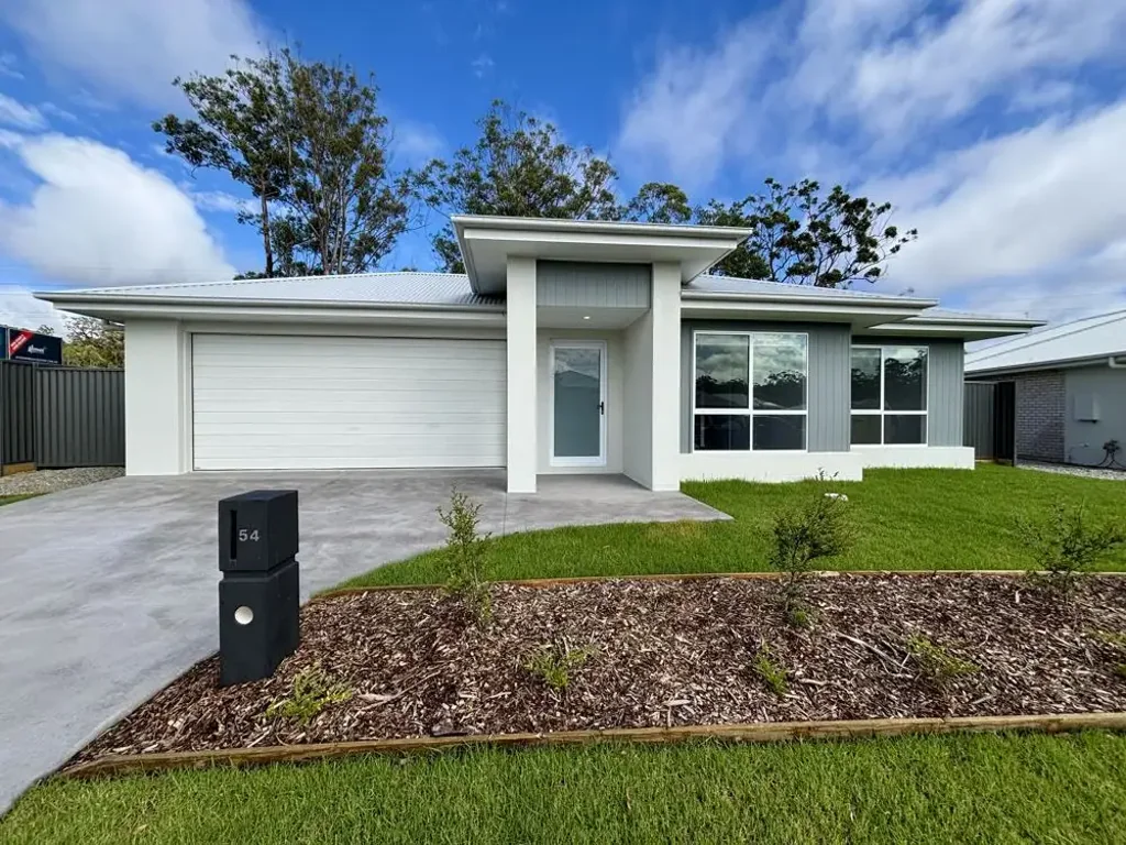 Stunning 4-bedroom home in the highly sought-after Moonee Beach Estate is ready to impress!