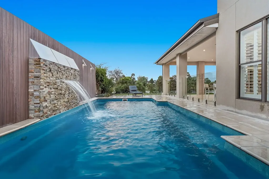 Waterways 5 Bedroom The Brief: A premium residence with tranquil backyard water views and seamless indoor outdoor entertaining