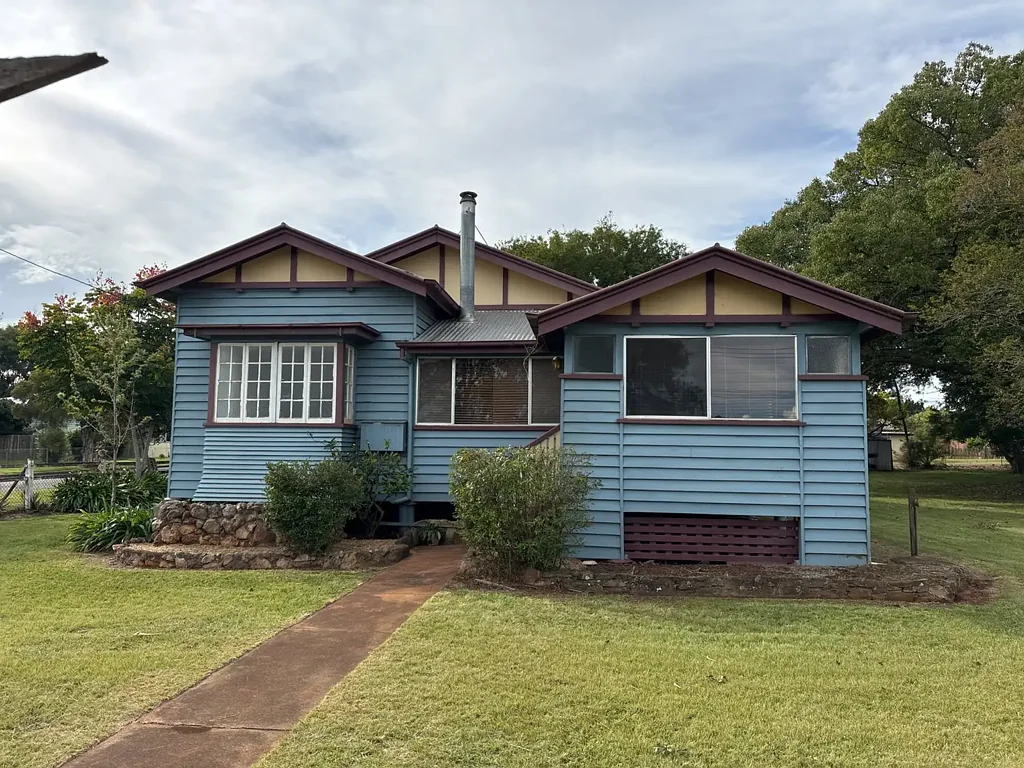 Fully fenced 4 Bedroom home with fireplace and A/C