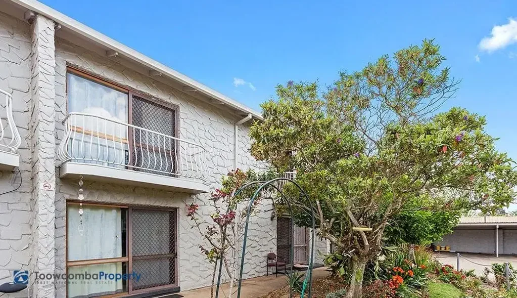 Impressive two bedroom townhouse located close to parks, shops and schools.